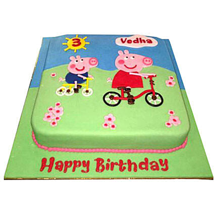 Peppa Pig on a cycle Cake: Peppa Pig Cake