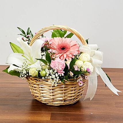 Basket Arrangement Of Gorgeous Flowers: Newborn Baby Gift Ideas