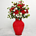 Red Carnations In Red Glass Vase