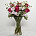 Roses Arrangement In Glass Vase