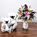 Pink and Purple Flowers In Vase With Teddy Bears