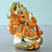 Gold Plated Orange Ganesha Idol