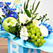 Vase Arrangement Of Flowers And Juicy Fruits