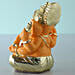 Gold Plated Orange Ganesha Idol