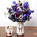 Purple and Blue Flower Arrangement With Truffles