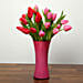 Red and Pink Tulips In Glass Vase