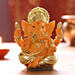 Gold Plated Orange Ganesha Idol